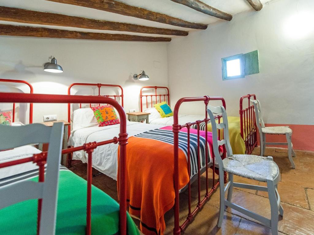 Postel nebo postele na pokoji v ubytování Lively holiday home in Fraga with private pool