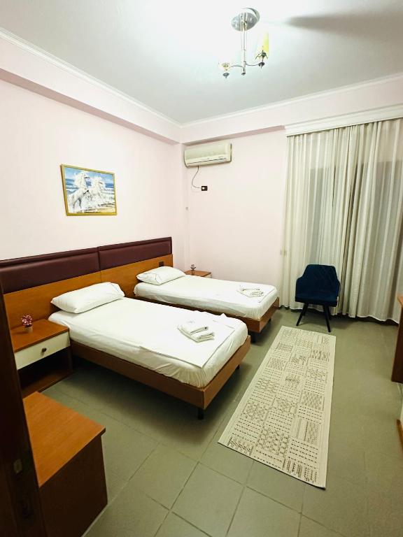 Postel nebo postele na pokoji v ubytování Hotel Edland