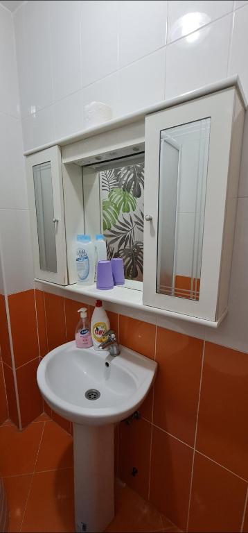 Koupelna v ubytování Rexha Apartments