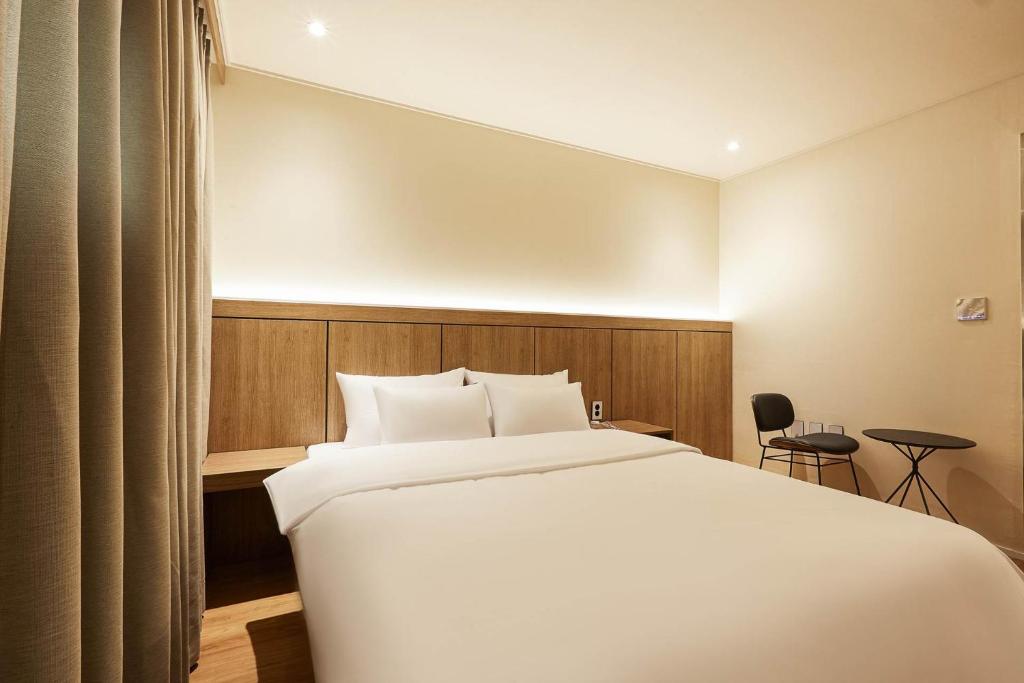 Postel nebo postele na pokoji v ubytování vane hotel