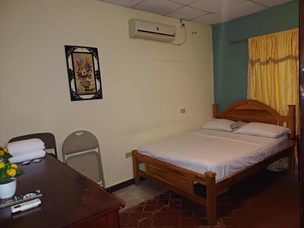 Vuode tai vuoteita majoituspaikassa BlueRock Hostal