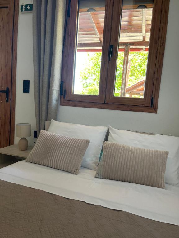 Postel nebo postele na pokoji v ubytování Villa del Vino