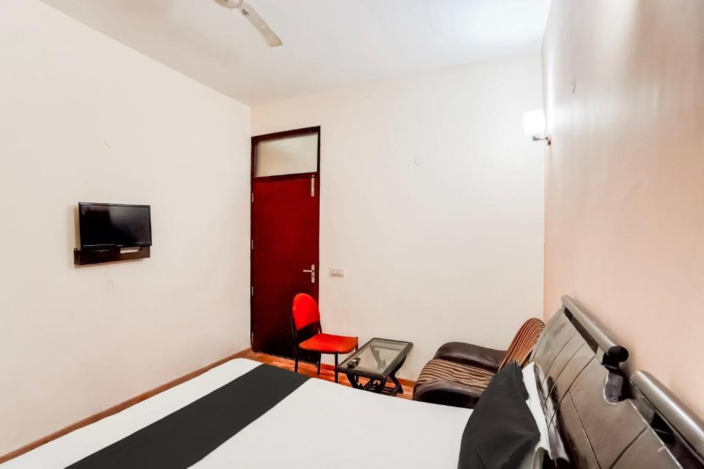TV a/nebo společenská místnost v ubytování Hotel O Le Regent