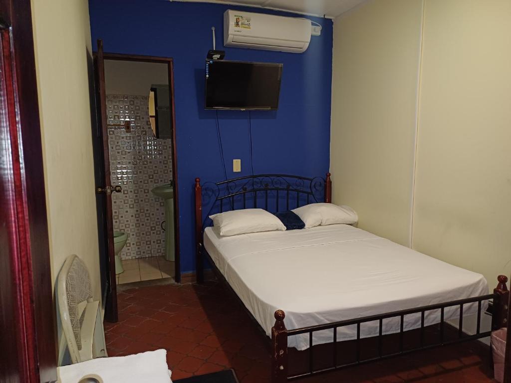 Vuode tai vuoteita majoituspaikassa BlueRock Hostal
