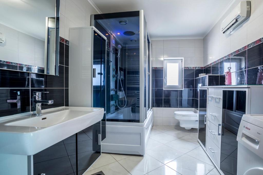 Kúpeľňa v ubytovaní Apartment Alduk
