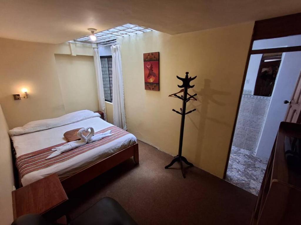 Postel nebo postele na pokoji v ubytování Andean Dreams 1