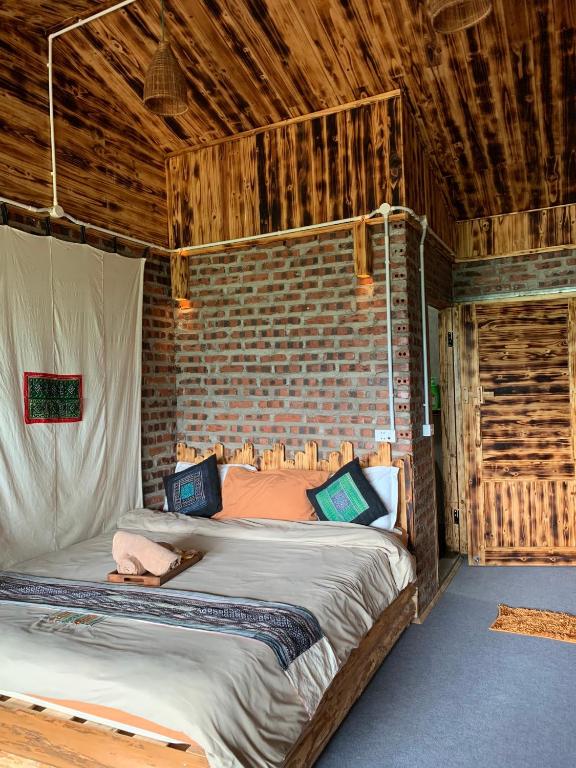 Postel nebo postele na pokoji v ubytování Sapa Plum Eco House