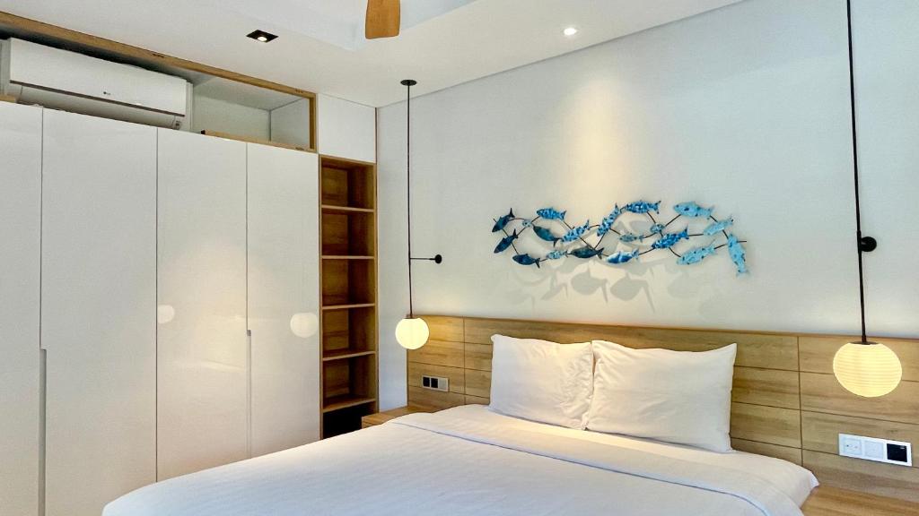 Postel nebo postele na pokoji v ubytování Moon Villa Phu Quoc - 3 Bedroom - Private pool