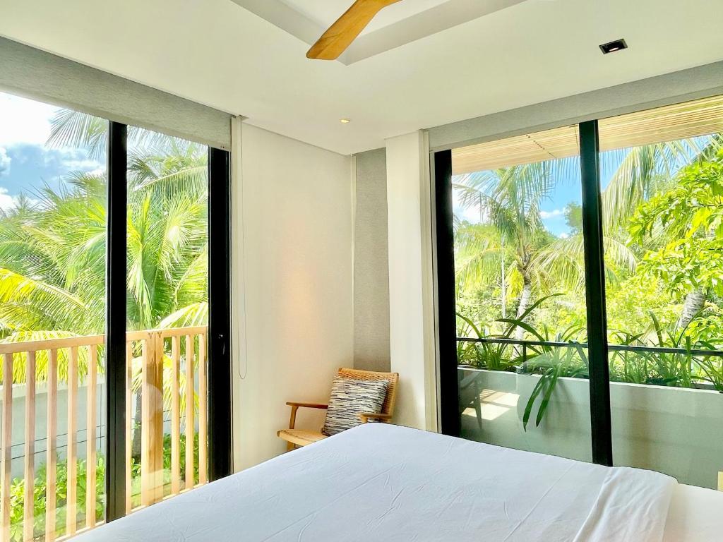 Postel nebo postele na pokoji v ubytování Moon Villa Phu Quoc - 3 Bedroom - Private pool