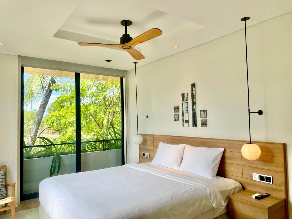 Postel nebo postele na pokoji v ubytování Moon Villa Phu Quoc - 3 Bedroom - Private pool
