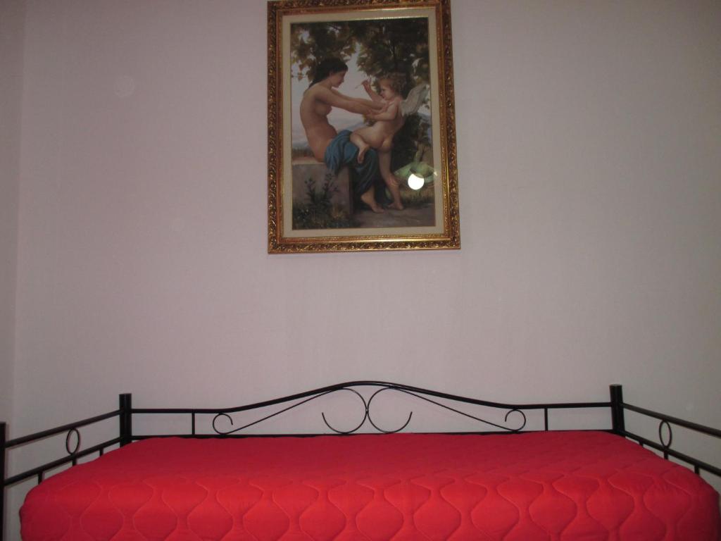Posteľ alebo postele v izbe v ubytovaní Palinuro casa vacanze "Donna Antonia"