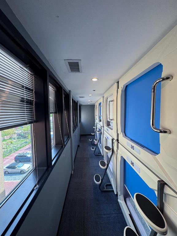 TV a/nebo společenská místnost v ubytování U Street Capsule Hostel