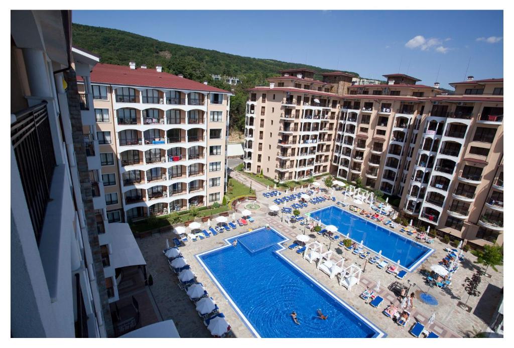 an aerial view of a swimming pool in a resort at Europroperties Bendita Mare Apartments in Golden Sands