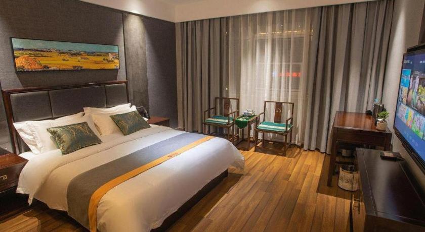 Postel nebo postele na pokoji v ubytování Shell Hotel Tai'an Feicheng Longshan Road