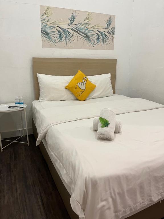 Postel nebo postele na pokoji v ubytování IMPRESS HOTEL