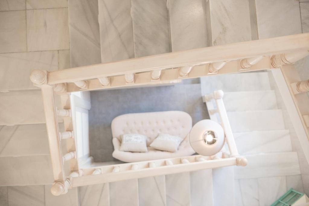 Posteľ alebo postele v izbe v ubytovaní Hostal Romerito