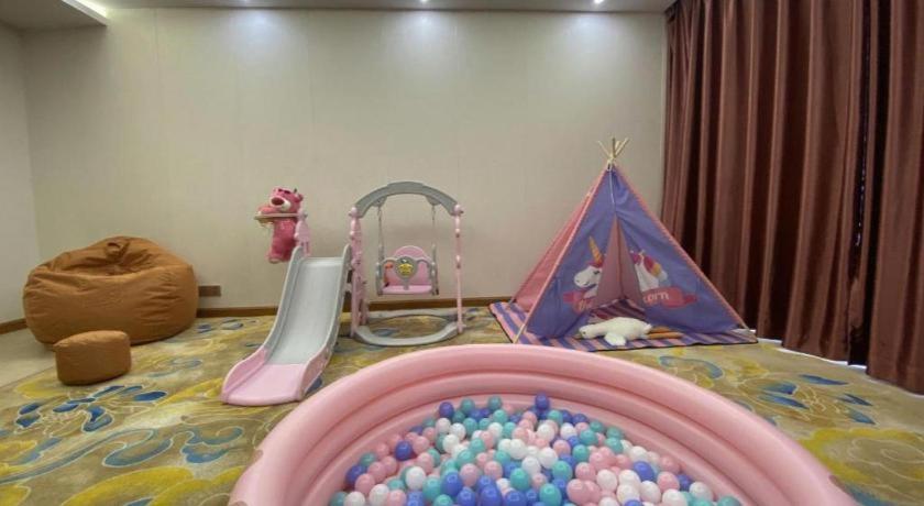 Postel nebo postele na pokoji v ubytování Oriental Hotel