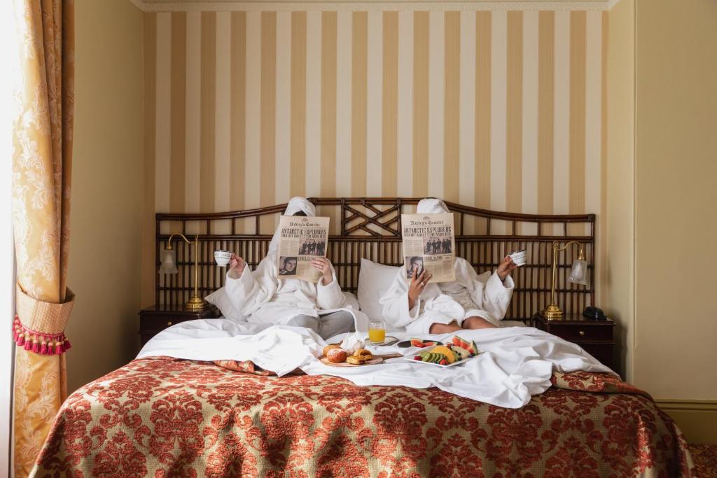 Postel nebo postele na pokoji v ubytování Hadley's Orient Hotel