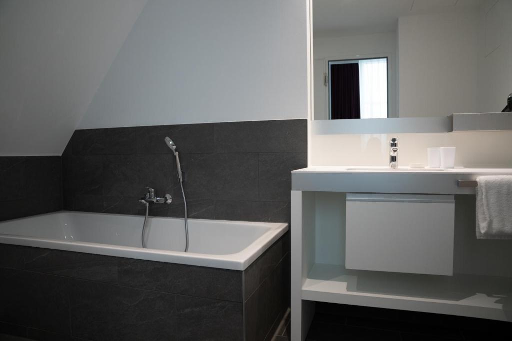 Koupelna v ubytování Grimms Hotel Hanau