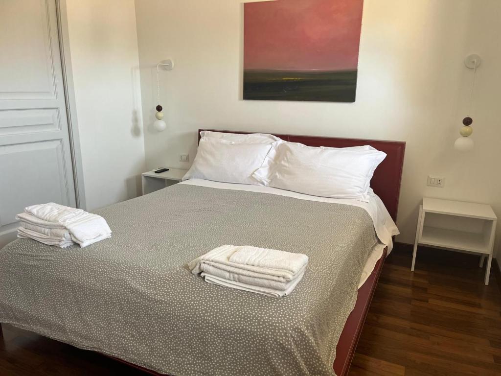 Postel nebo postele na pokoji v ubytování La Via della Giudecca