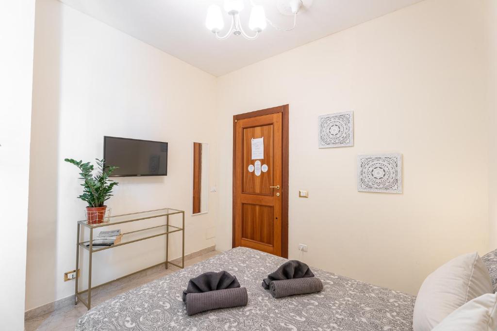 Telewizja i/lub zestaw kina domowego w obiekcie BigFamilyFlats - Vatican & Navona