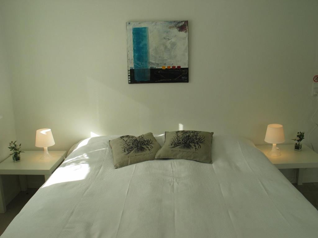 Postel nebo postele na pokoji v ubytování Aalborg City Rooms ApS