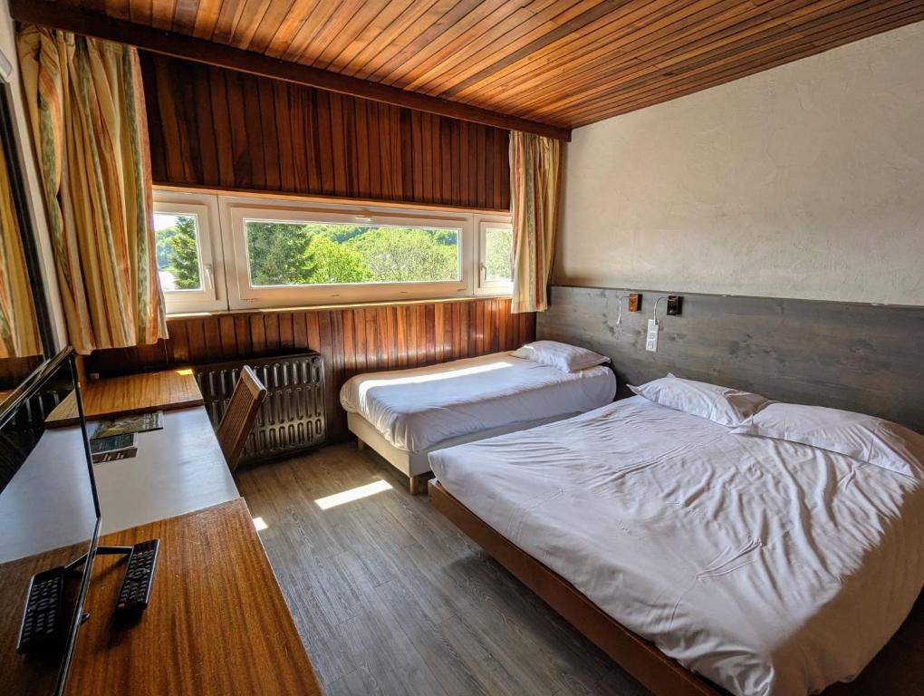 Postel nebo postele na pokoji v ubytování Gergovia