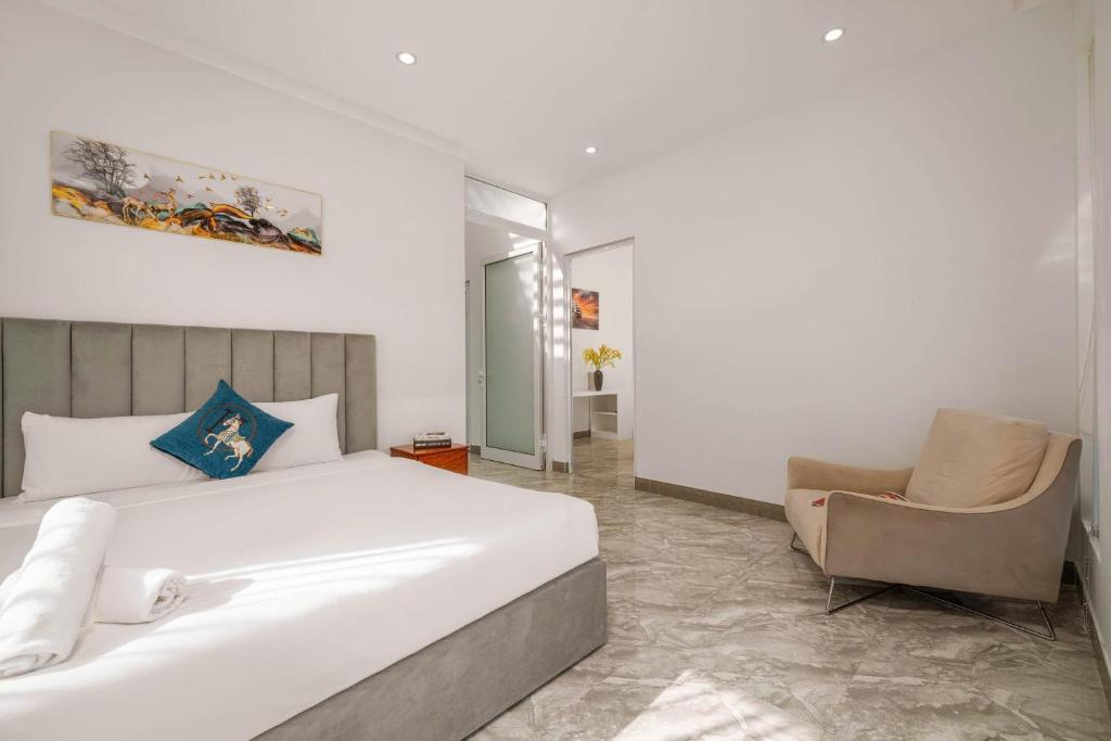 Ένα ή περισσότερα κρεβάτια σε δωμάτιο στο Khanh Villa Phuoc Truong 2 - Venuestay