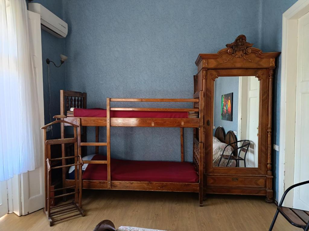 Postel nebo postele na pokoji v ubytování Guest House Irina Tbilisi