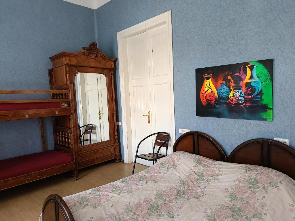 Postel nebo postele na pokoji v ubytování Guest House Irina Tbilisi