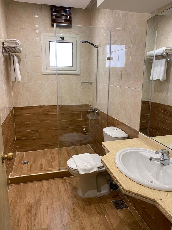 Koupelna v ubytování Golden Carven Hotel
