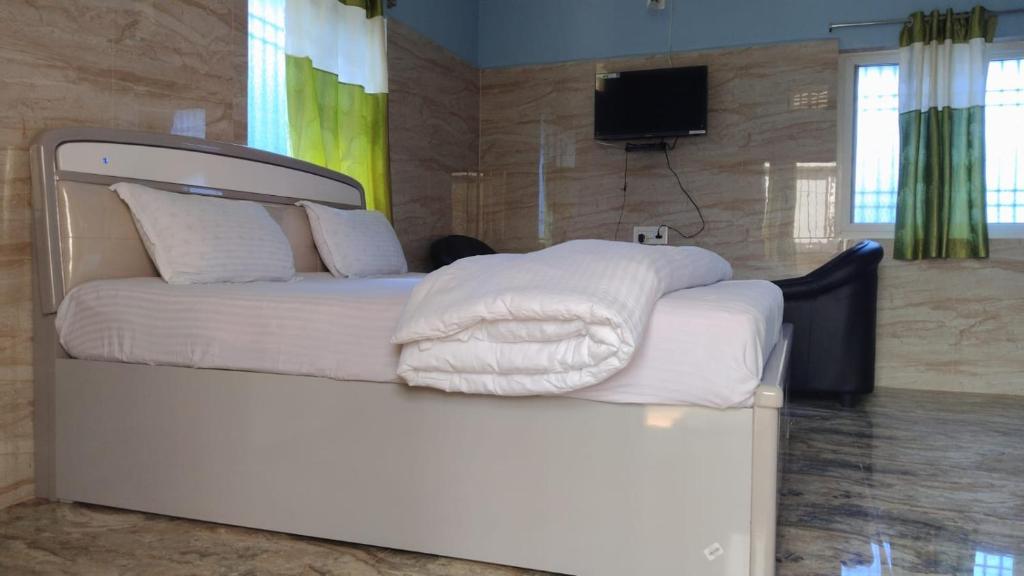 Postel nebo postele na pokoji v ubytování Okaasan Guest House
