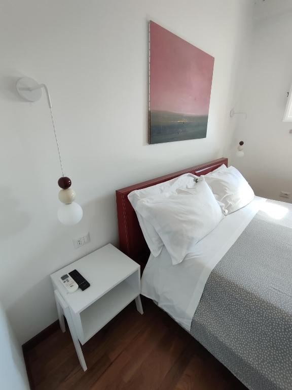 Postel nebo postele na pokoji v ubytování La Via della Giudecca