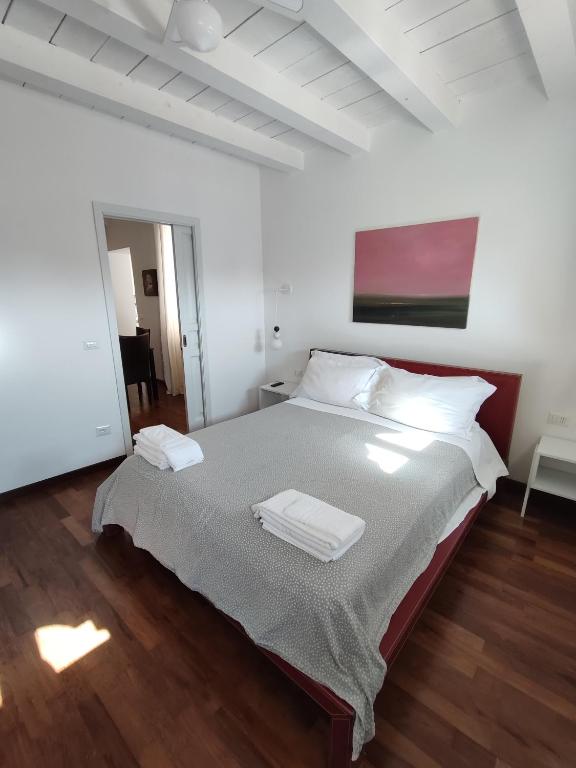 Postel nebo postele na pokoji v ubytování La Via della Giudecca