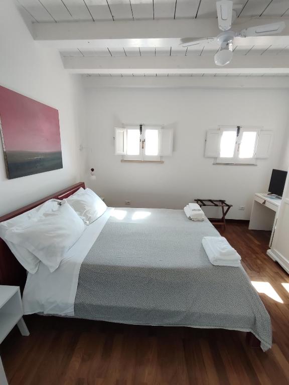 Postel nebo postele na pokoji v ubytování La Via della Giudecca