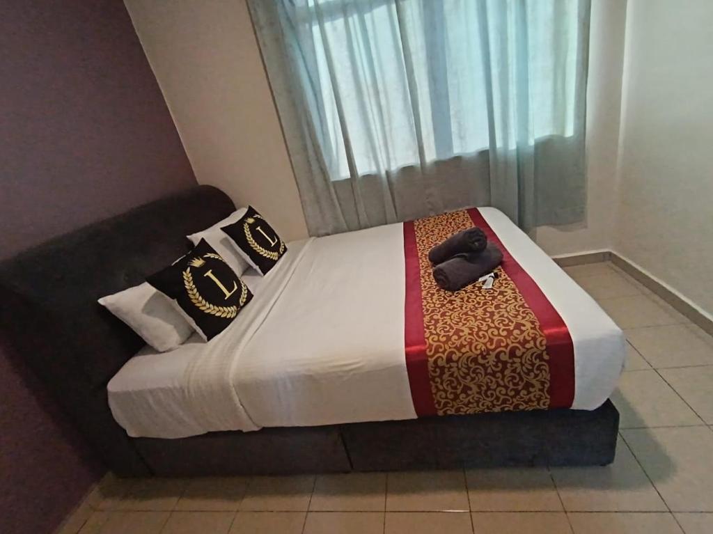 Postel nebo postele na pokoji v ubytování L Ferringhi Hotel