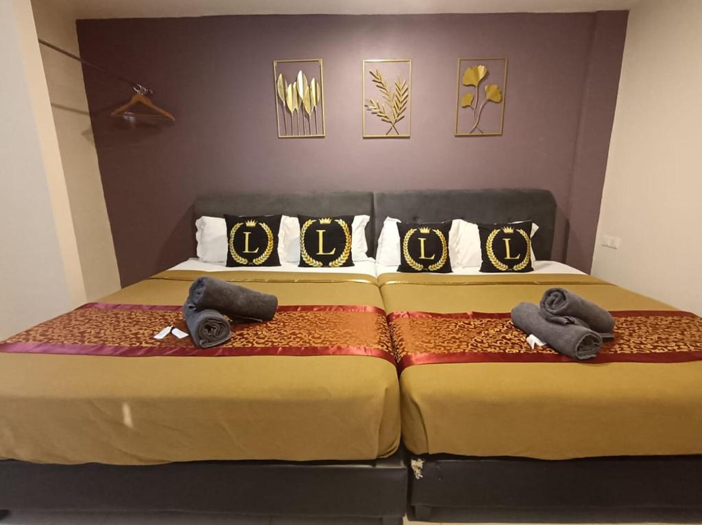 Postel nebo postele na pokoji v ubytování L Ferringhi Hotel