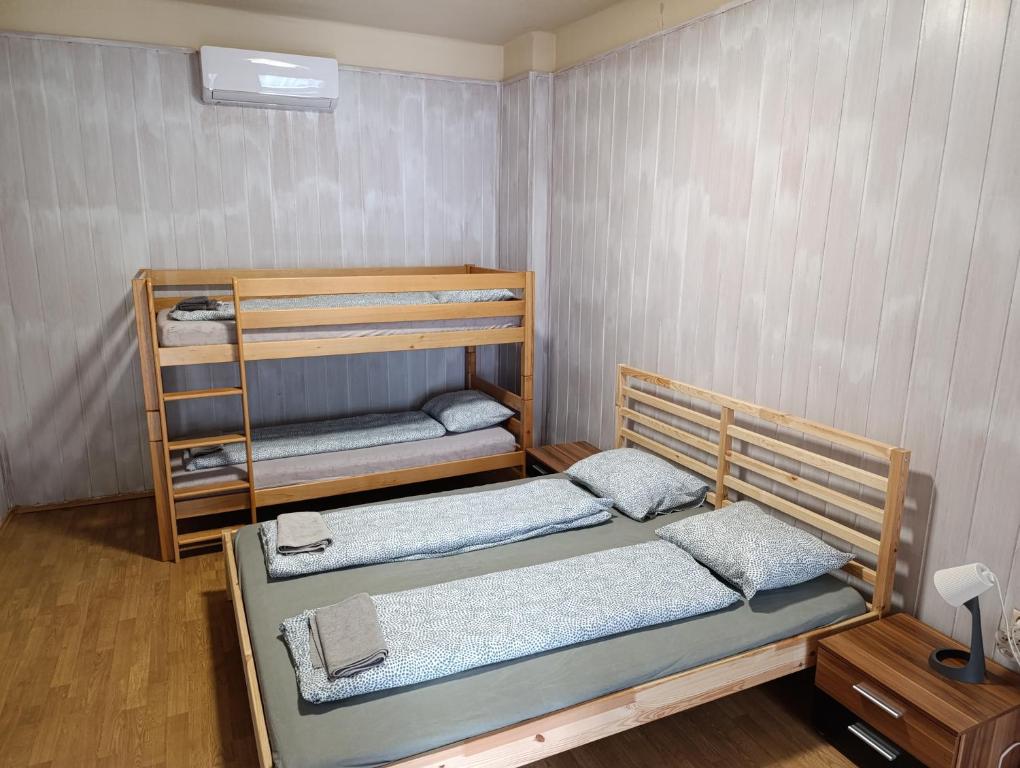 A bed or beds in a room at Village Park