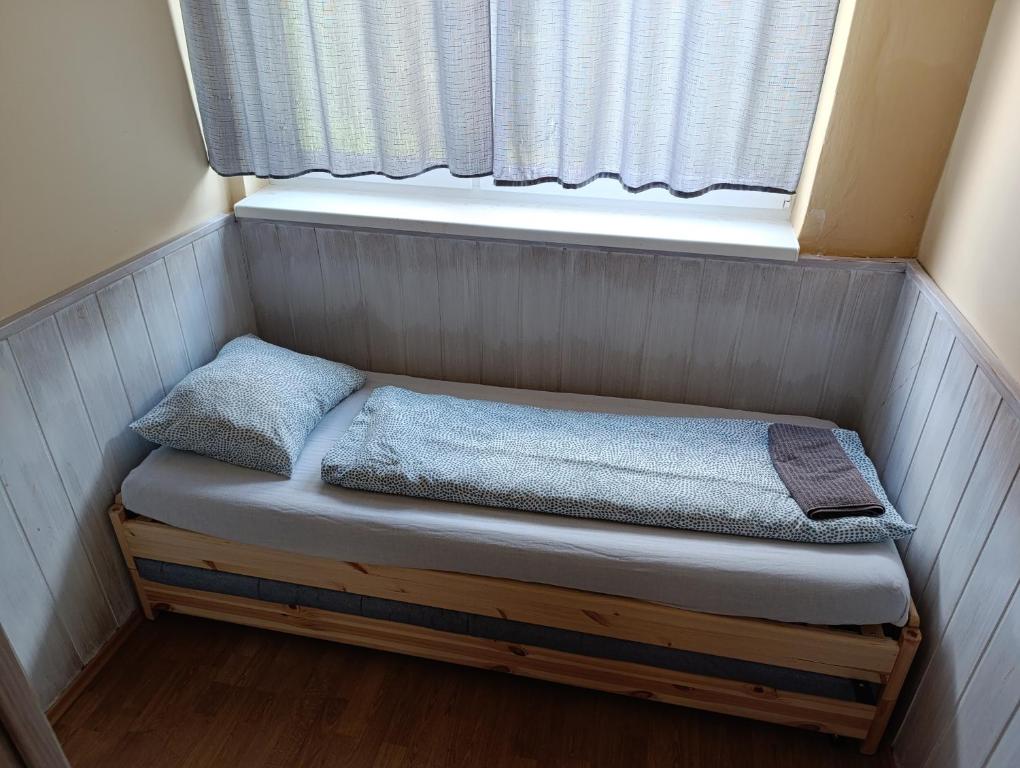 A bed or beds in a room at Village Park