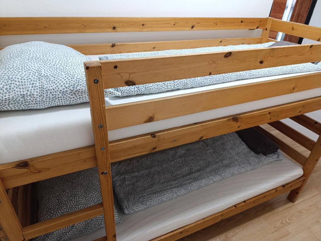 A bed or beds in a room at Village Park