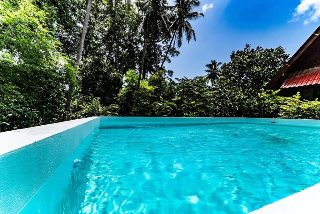 Bazén v ubytování Villa Primor madawan 3BR with pool nebo v jeho okolí