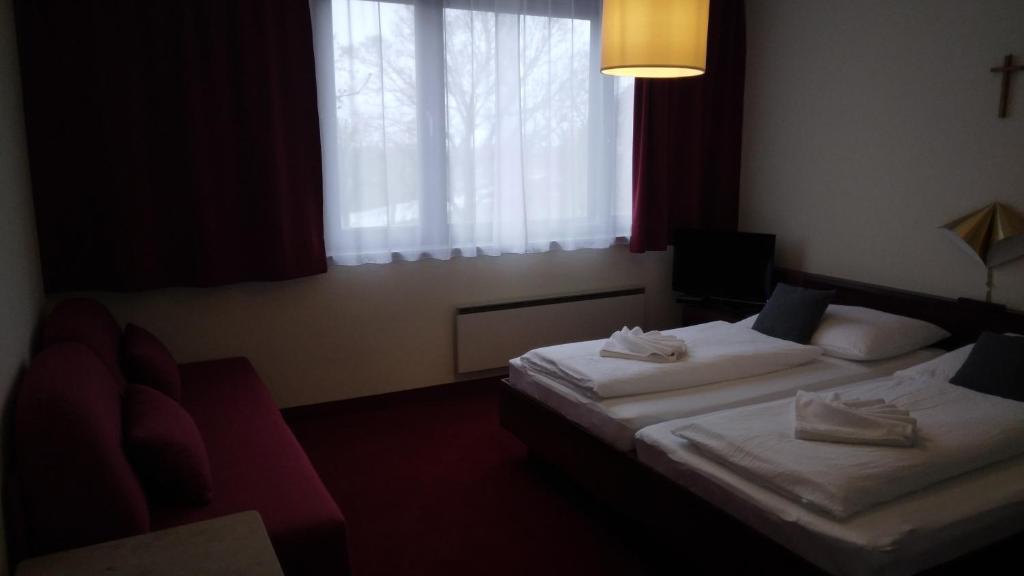 Postel nebo postele na pokoji v ubytování Ferienherbergen S & J Zeisz