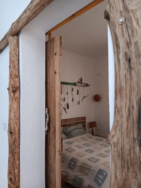 Postel nebo postele na pokoji v ubytování l' Escapade El Haouaria