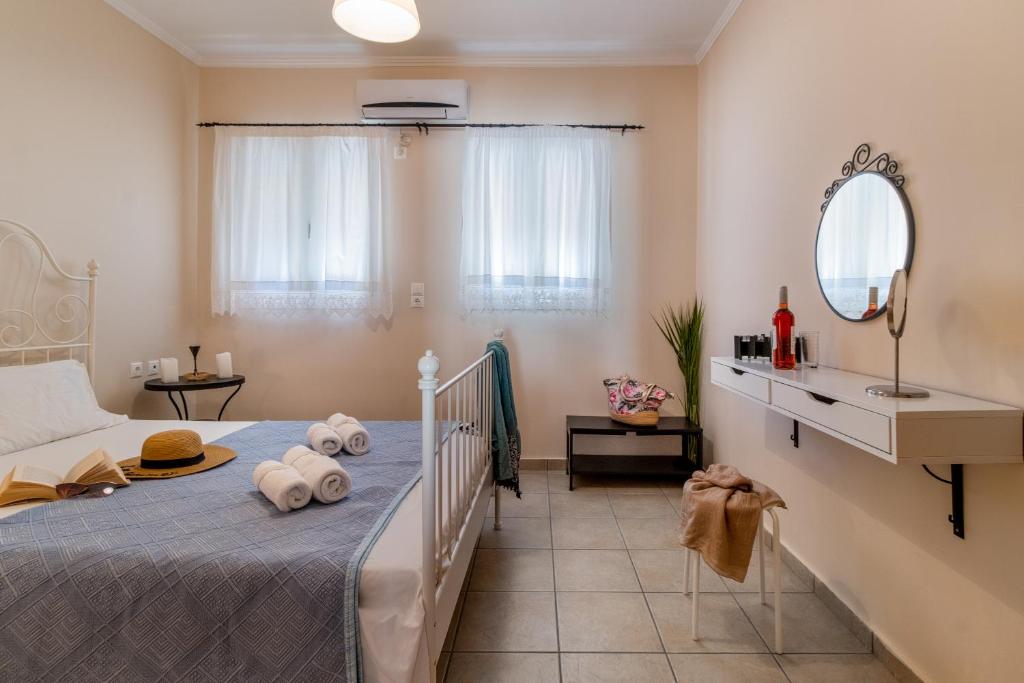 A bed or beds in a room at Villa Votistis A1