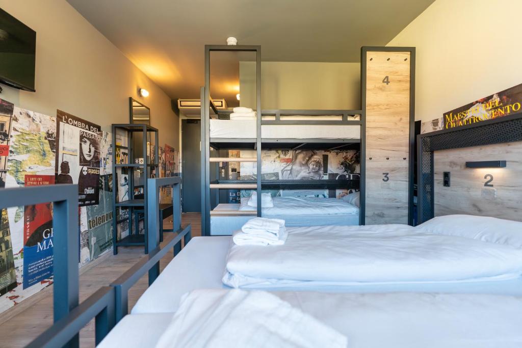 Postel nebo postele na pokoji v ubytování a&o Hostel Firenze Campo di Marte
