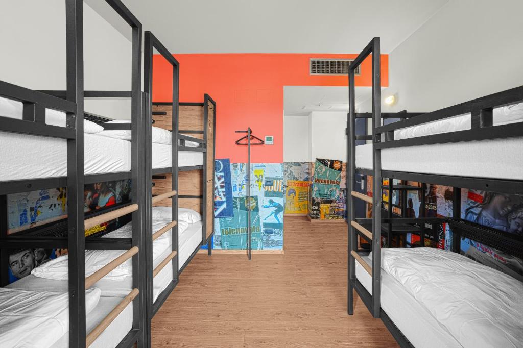 Postel nebo postele na pokoji v ubytování a&o Hostel Firenze Campo di Marte