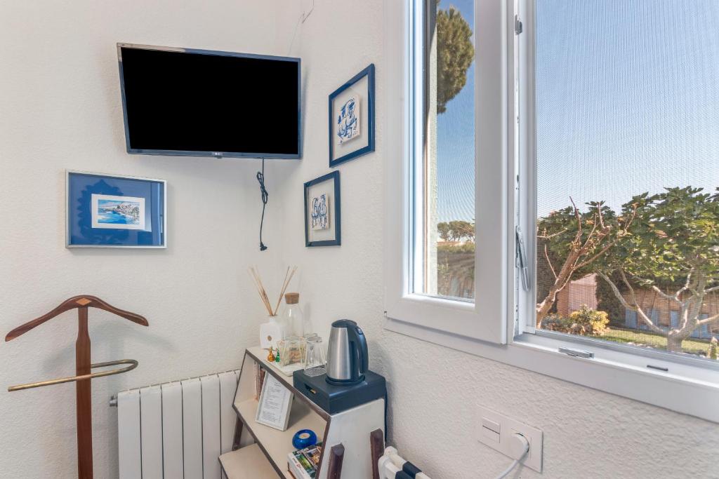 TV a/nebo společenská místnost v ubytování Chalet Casa Azul