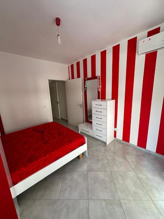 Postel nebo postele na pokoji v ubytování Apartments Shengjin Berti