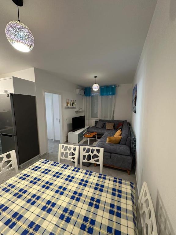 Postel nebo postele na pokoji v ubytování Apartments Shengjin Berti