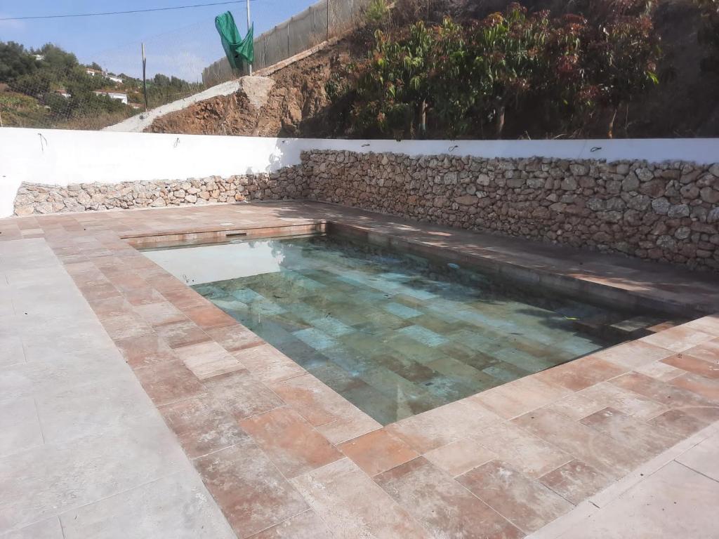 Bazén v ubytovaní Villa Capricho Nerja alebo v jeho blízkosti